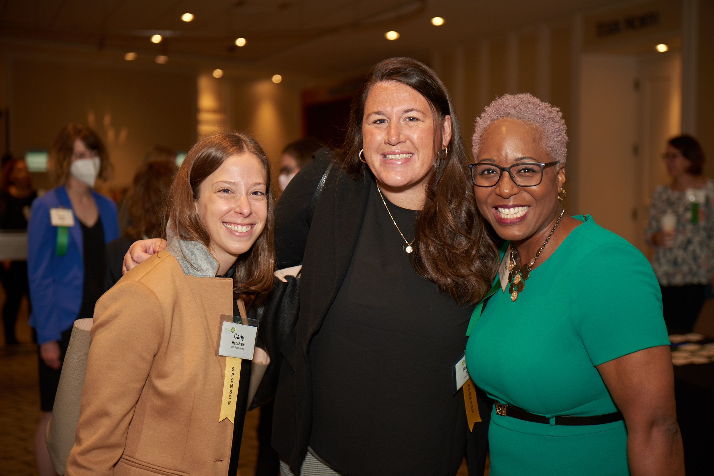 Group of three women smiling