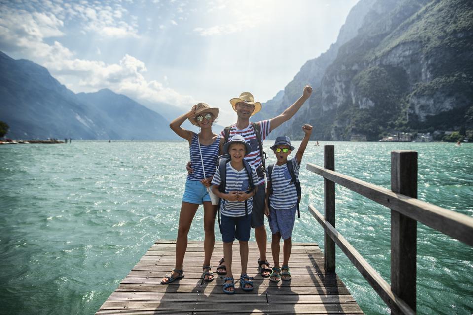 Family photo on a dock by a lake