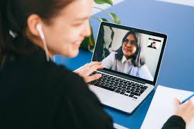 Woman sitting at computer